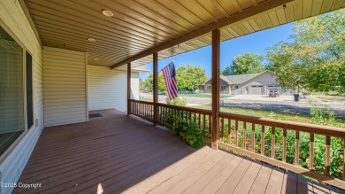Beautifully maintained 4 bed, 3 bath custom home with 2,624 sq on The Golf Club At Devils Tower in Wyoming - for sale on GolfHomes.com, golf home, golf lot