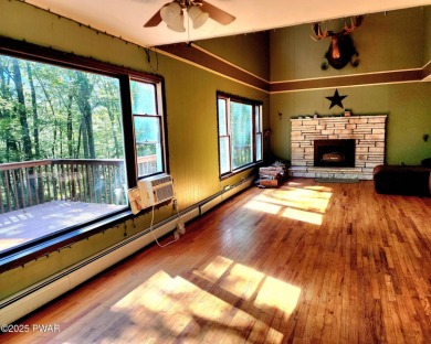 Entertainers delight inside and out with surprise lake view and on Lords Valley Country Club, Inc in Pennsylvania - for sale on GolfHomes.com, golf home, golf lot