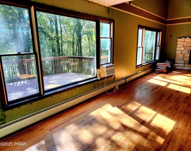 Entertainers delight inside and out with surprise lake view and on Lords Valley Country Club, Inc in Pennsylvania - for sale on GolfHomes.com, golf home, golf lot