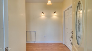 Beautifully maintained 4 bed, 3 bath custom home with 2,624 sq on The Golf Club At Devils Tower in Wyoming - for sale on GolfHomes.com, golf home, golf lot