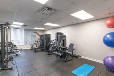 Enjoy serene views from this charming 1st floor 2BR/2BA + Den on Boca Delray Golf and Country Club in Florida - for sale on GolfHomes.com, golf home, golf lot