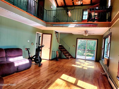 Entertainers delight inside and out with surprise lake view and on Lords Valley Country Club, Inc in Pennsylvania - for sale on GolfHomes.com, golf home, golf lot