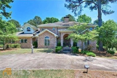 This Custom home is located on the 13th hole of the North Nob on Nob North Golf Course in Georgia - for sale on GolfHomes.com, golf home, golf lot