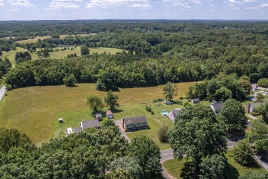 Beautifully renovated 4 bedroom 3 bath home with mountain views on Poplar Forest Golf Course in Virginia - for sale on GolfHomes.com, golf home, golf lot