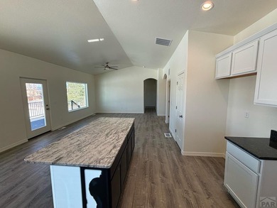 Beautiful 3-bedroom, 2-bathroom ranch-style home with a 3-car on Desert Hawk At Pueblo West in Colorado - for sale on GolfHomes.com, golf home, golf lot