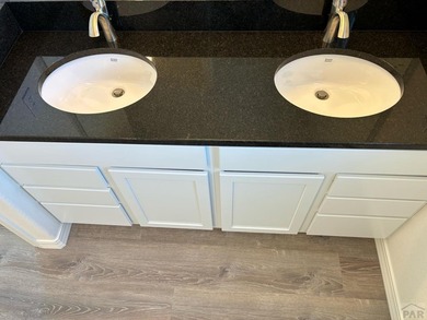 Beautiful 3-bedroom, 2-bathroom ranch-style home with a 3-car on Desert Hawk At Pueblo West in Colorado - for sale on GolfHomes.com, golf home, golf lot