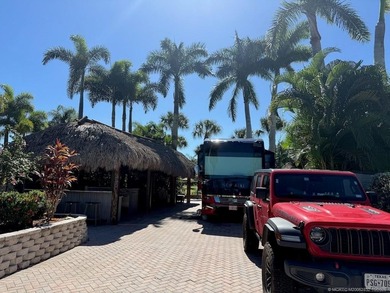 Golfer's Paradise with Unmatched Views and Upgraded Outdoor on Motorcoach Resort Golf Course in Florida - for sale on GolfHomes.com, golf home, golf lot