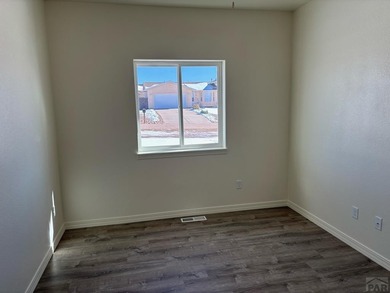 Beautiful 3-bedroom, 2-bathroom ranch-style home with a 3-car on Desert Hawk At Pueblo West in Colorado - for sale on GolfHomes.com, golf home, golf lot