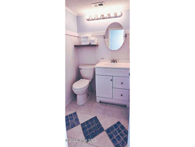 3rd floor condo with beautiful ocean views with the added perk on The Country Club of the Crystal Coast in North Carolina - for sale on GolfHomes.com, golf home, golf lot