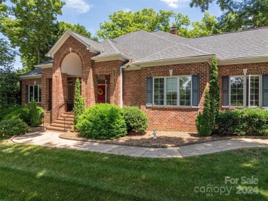 This gorgeous sprawling 1.5 story home is located in the premier on Rock Barn Golf and Spa in North Carolina - for sale on GolfHomes.com, golf home, golf lot