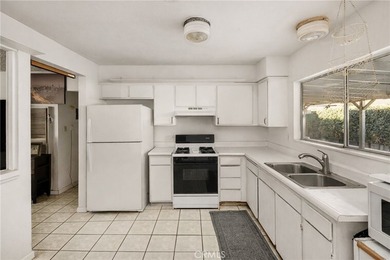 Excellent duplex opportunity in the desirable Westside Costa on Santa Ana Country Club in California - for sale on GolfHomes.com, golf home, golf lot