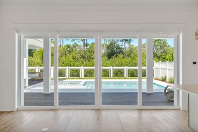 Step into refined coastal luxury with the Suffolk II, an on Origins Golf Club in Florida - for sale on GolfHomes.com, golf home, golf lot