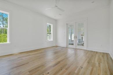 Step into refined coastal luxury with the Suffolk II, an on Origins Golf Club in Florida - for sale on GolfHomes.com, golf home, golf lot