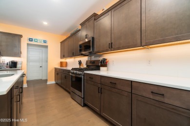 This beautifully crafted home combines refined finishes with on Minnesott Golf and Country Club in North Carolina - for sale on GolfHomes.com, golf home, golf lot
