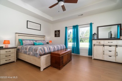 This beautifully crafted home combines refined finishes with on Minnesott Golf and Country Club in North Carolina - for sale on GolfHomes.com, golf home, golf lot