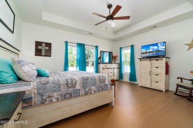 This beautifully crafted home combines refined finishes with on Minnesott Golf and Country Club in North Carolina - for sale on GolfHomes.com, golf home, golf lot
