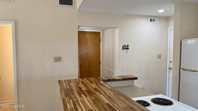 2 Bedrm, 2.5 Bath. Condo with unique investment / low on Harbour Point Golf Club in North Carolina - for sale on GolfHomes.com, golf home, golf lot