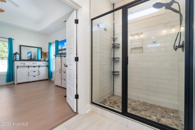This beautifully crafted home combines refined finishes with on Minnesott Golf and Country Club in North Carolina - for sale on GolfHomes.com, golf home, golf lot