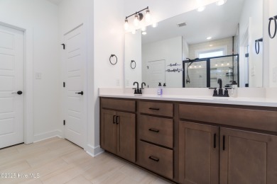 This beautifully crafted home combines refined finishes with on Minnesott Golf and Country Club in North Carolina - for sale on GolfHomes.com, golf home, golf lot