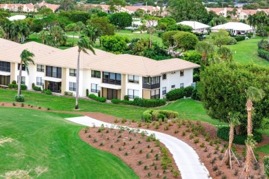 Step into this beautifully updated 2nd floor corner condominium on Pine Tree Golf Club in Florida - for sale on GolfHomes.com, golf home, golf lot