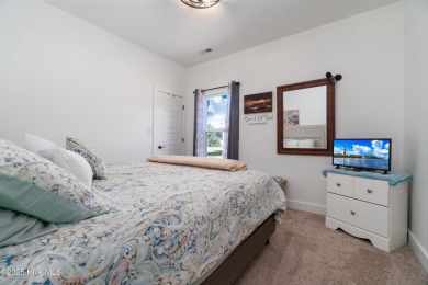 This beautifully crafted home combines refined finishes with on Minnesott Golf and Country Club in North Carolina - for sale on GolfHomes.com, golf home, golf lot