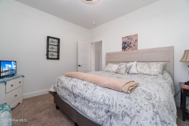 This beautifully crafted home combines refined finishes with on Minnesott Golf and Country Club in North Carolina - for sale on GolfHomes.com, golf home, golf lot