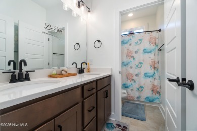 This beautifully crafted home combines refined finishes with on Minnesott Golf and Country Club in North Carolina - for sale on GolfHomes.com, golf home, golf lot