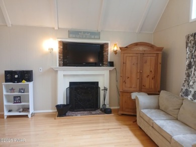 Escape to this delightful 3-bedroom, 1-bath chalet in the heart on The Hideout Golf in Pennsylvania - for sale on GolfHomes.com, golf home, golf lot