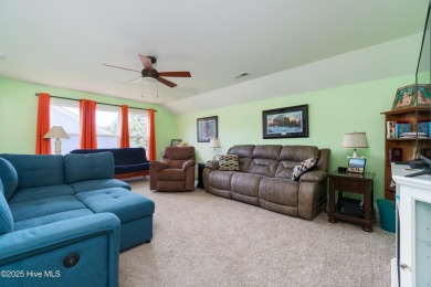 This beautifully crafted home combines refined finishes with on Minnesott Golf and Country Club in North Carolina - for sale on GolfHomes.com, golf home, golf lot
