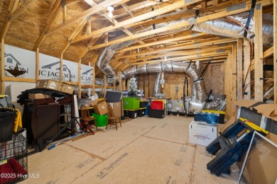 This beautifully crafted home combines refined finishes with on Minnesott Golf and Country Club in North Carolina - for sale on GolfHomes.com, golf home, golf lot