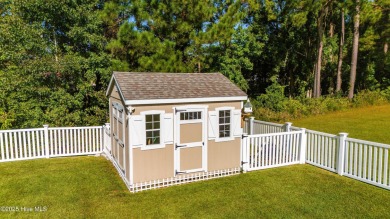 This beautifully crafted home combines refined finishes with on Minnesott Golf and Country Club in North Carolina - for sale on GolfHomes.com, golf home, golf lot