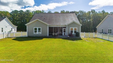 This beautifully crafted home combines refined finishes with on Minnesott Golf and Country Club in North Carolina - for sale on GolfHomes.com, golf home, golf lot