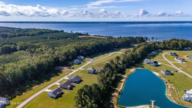 This beautifully crafted home combines refined finishes with on Minnesott Golf and Country Club in North Carolina - for sale on GolfHomes.com, golf home, golf lot