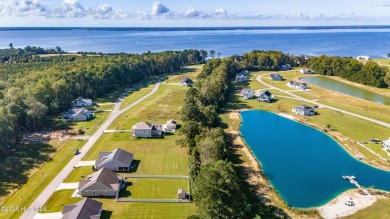 This beautifully crafted home combines refined finishes with on Minnesott Golf and Country Club in North Carolina - for sale on GolfHomes.com, golf home, golf lot