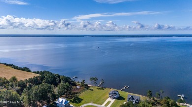 This beautifully crafted home combines refined finishes with on Minnesott Golf and Country Club in North Carolina - for sale on GolfHomes.com, golf home, golf lot