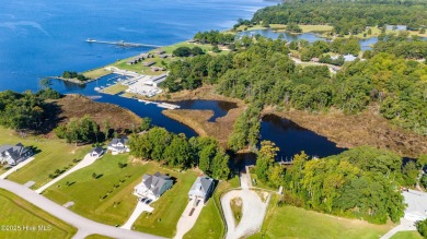 This beautifully crafted home combines refined finishes with on Minnesott Golf and Country Club in North Carolina - for sale on GolfHomes.com, golf home, golf lot