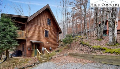 What everyone dreams of!  A log cabin on a mountain.  This one on Beech Mountain Club in North Carolina - for sale on GolfHomes.com, golf home, golf lot