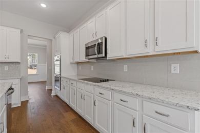 Step into luxury with the beautiful Jamestown model by Paran on Traditions of Braselton Golf Club in Georgia - for sale on GolfHomes.com, golf home, golf lot