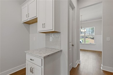 Step into luxury with the beautiful Jamestown model by Paran on Traditions of Braselton Golf Club in Georgia - for sale on GolfHomes.com, golf home, golf lot