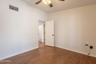 This beautifully updated gem effortlessly fuses timeless 1950s on Encanto 18 Golf Course in Arizona - for sale on GolfHomes.com, golf home, golf lot