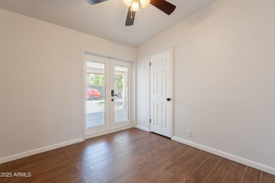 This beautifully updated gem effortlessly fuses timeless 1950s on Encanto 18 Golf Course in Arizona - for sale on GolfHomes.com, golf home, golf lot