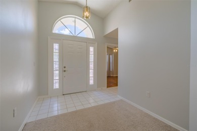 Showcasing a home from the Rosewood at The Gardens community in on Palm Aire Country Club of Sarasota in Florida - for sale on GolfHomes.com, golf home, golf lot