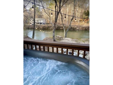 Riverfront living at it's finest with 110 feet of river frontage on White Path Golf Club in Georgia - for sale on GolfHomes.com, golf home, golf lot
