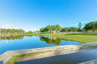 Ready for some Fun in the Sun! Welcome to Barefoot Bay! Adorable on Barefoot Bay Golf Course in Florida - for sale on GolfHomes.com, golf home, golf lot