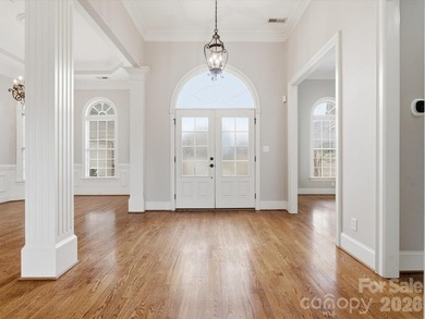 Overlooking the 11th hole of Waterford Golf Club and a tranquil on Waterford Golf Club in South Carolina - for sale on GolfHomes.com, golf home, golf lot