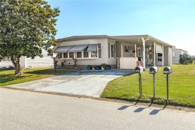 Ready for some Fun in the Sun! Welcome to Barefoot Bay! Adorable on Barefoot Bay Golf Course in Florida - for sale on GolfHomes.com, golf home, golf lot