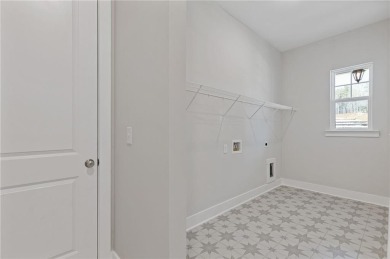 Step into luxury with the beautiful Jamestown model by Paran on Traditions of Braselton Golf Club in Georgia - for sale on GolfHomes.com, golf home, golf lot