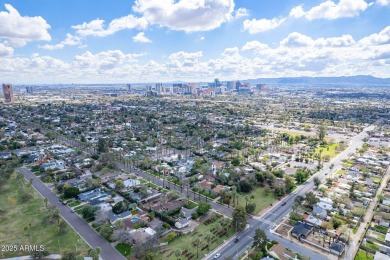 This beautifully updated gem effortlessly fuses timeless 1950s on Encanto 18 Golf Course in Arizona - for sale on GolfHomes.com, golf home, golf lot