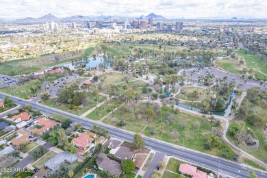 This beautifully updated gem effortlessly fuses timeless 1950s on Encanto 18 Golf Course in Arizona - for sale on GolfHomes.com, golf home, golf lot
