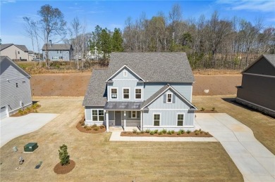 Step into luxury with the beautiful Jamestown model by Paran on Traditions of Braselton Golf Club in Georgia - for sale on GolfHomes.com, golf home, golf lot